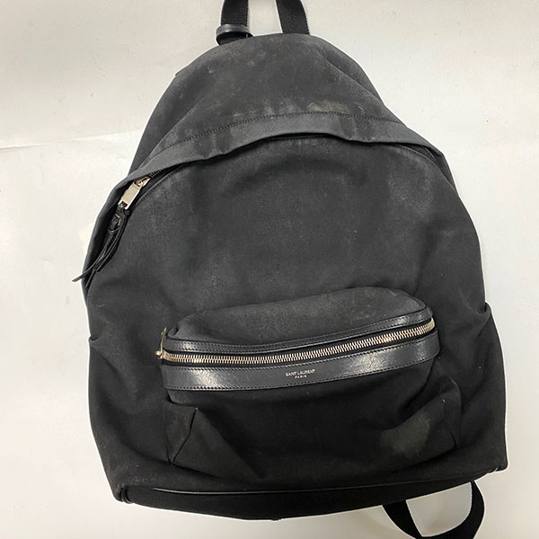 サンローラン キャンバスリュック クリーニング前：全体的な色あせと角の白スレが目立つ状態